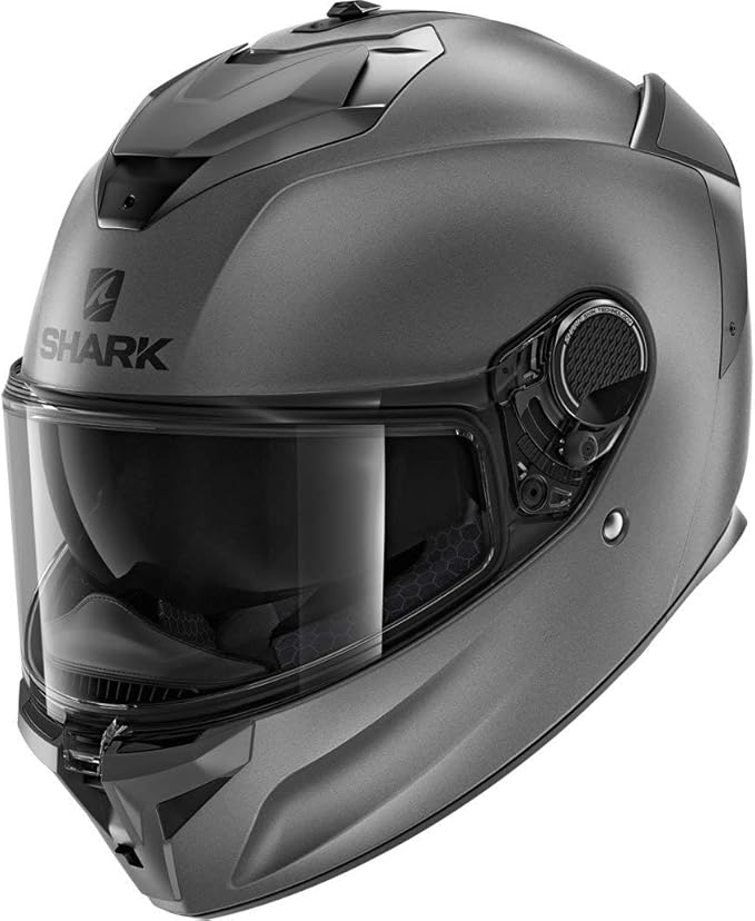 Matte black Shark Spartan GT helmet with a sleek modular design, integrated sun visor, and aerodynamic contouring.