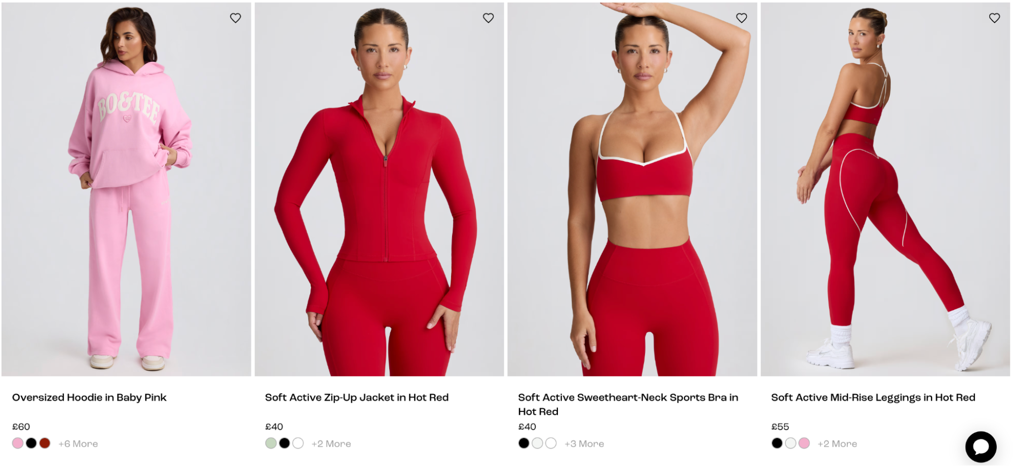 Models showcase Bo+Tee’s Soft Active collection including a baby pink oversized hoodie and coordinated hot red zip-up jacket, sweetheart-neck sports bra, and mid-rise leggings—perfect for bold, sculpted Pilates looks.