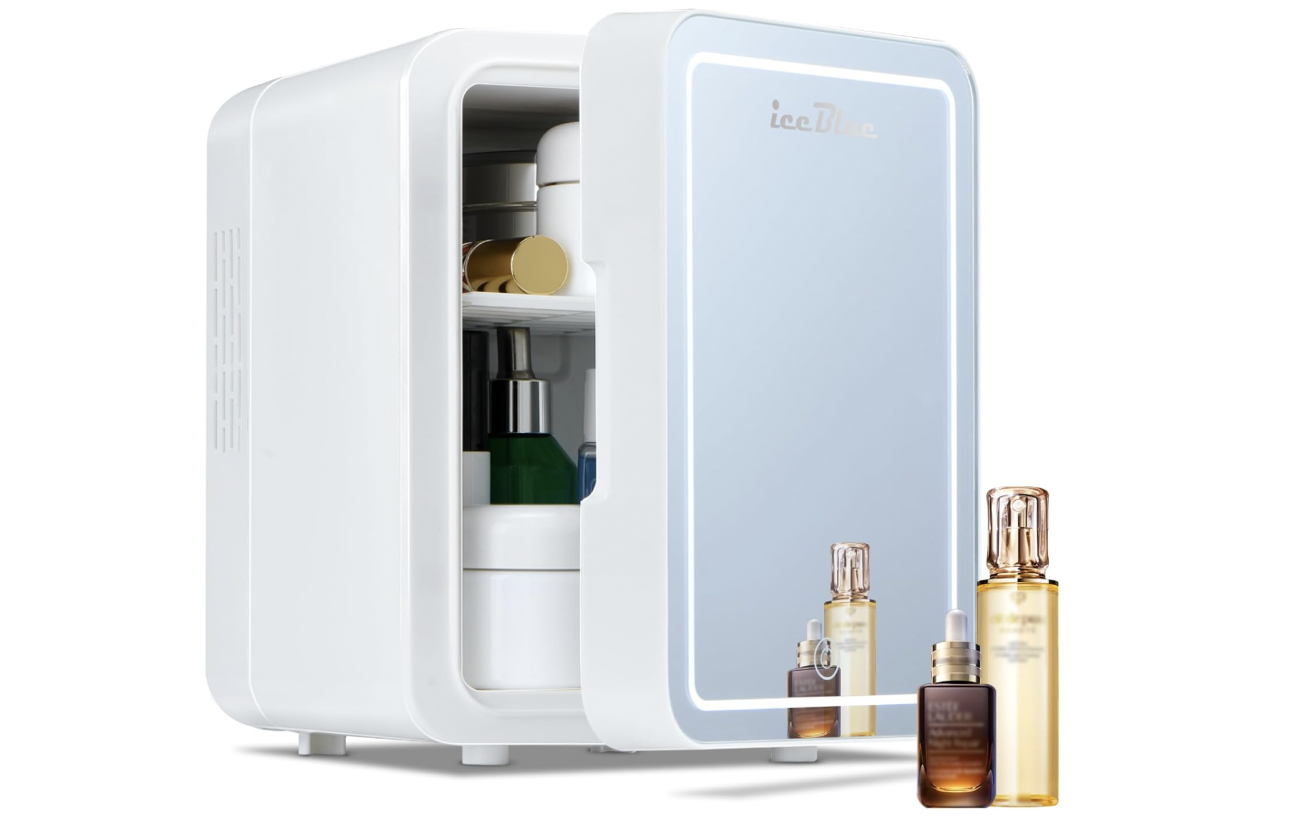 A white IceBlue mini fridge with a mirrored front door and built-in LED light, partially open to reveal organized skincare products and serums.