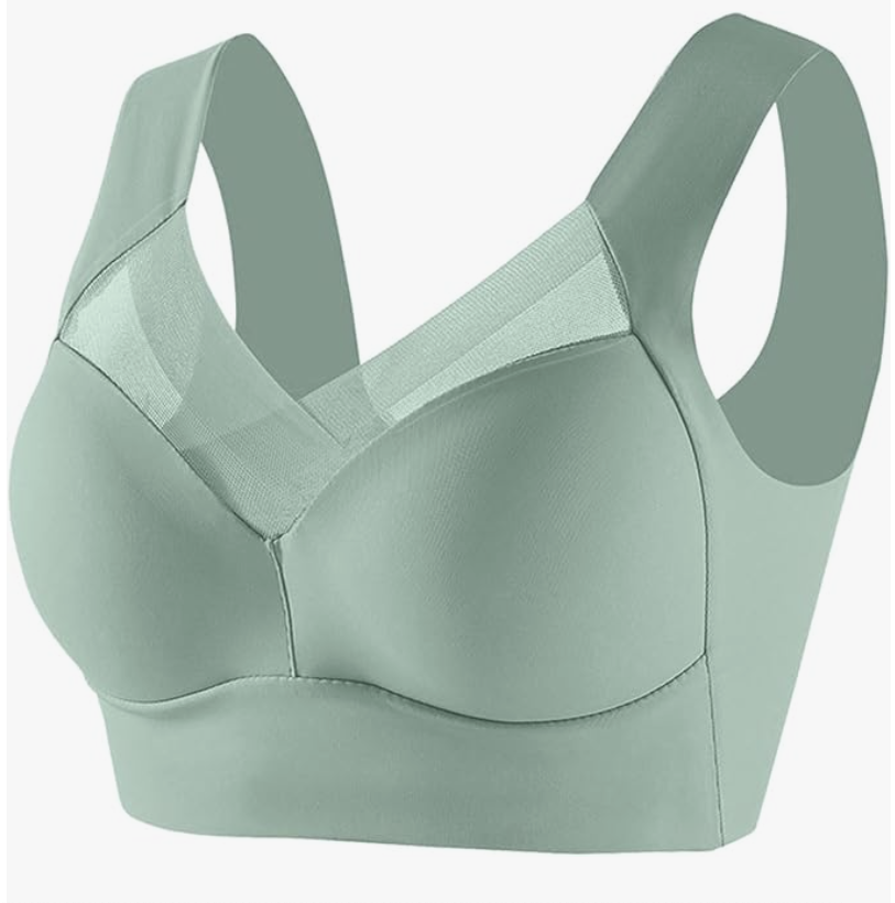 A light green wireless support bra featuring a wide band, soft molded cups, and a sheer mesh panel along the neckline for added breathability and style.