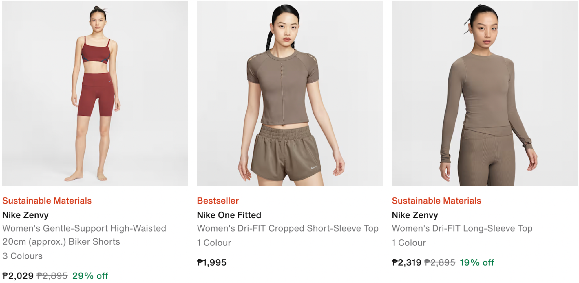 Models wear Nike Zenvy biker shorts, Dri-FIT tops, and the bestselling Nike One Fitted tee—sustainable, supportive activewear ideal for Pilates, gym, and everyday training.