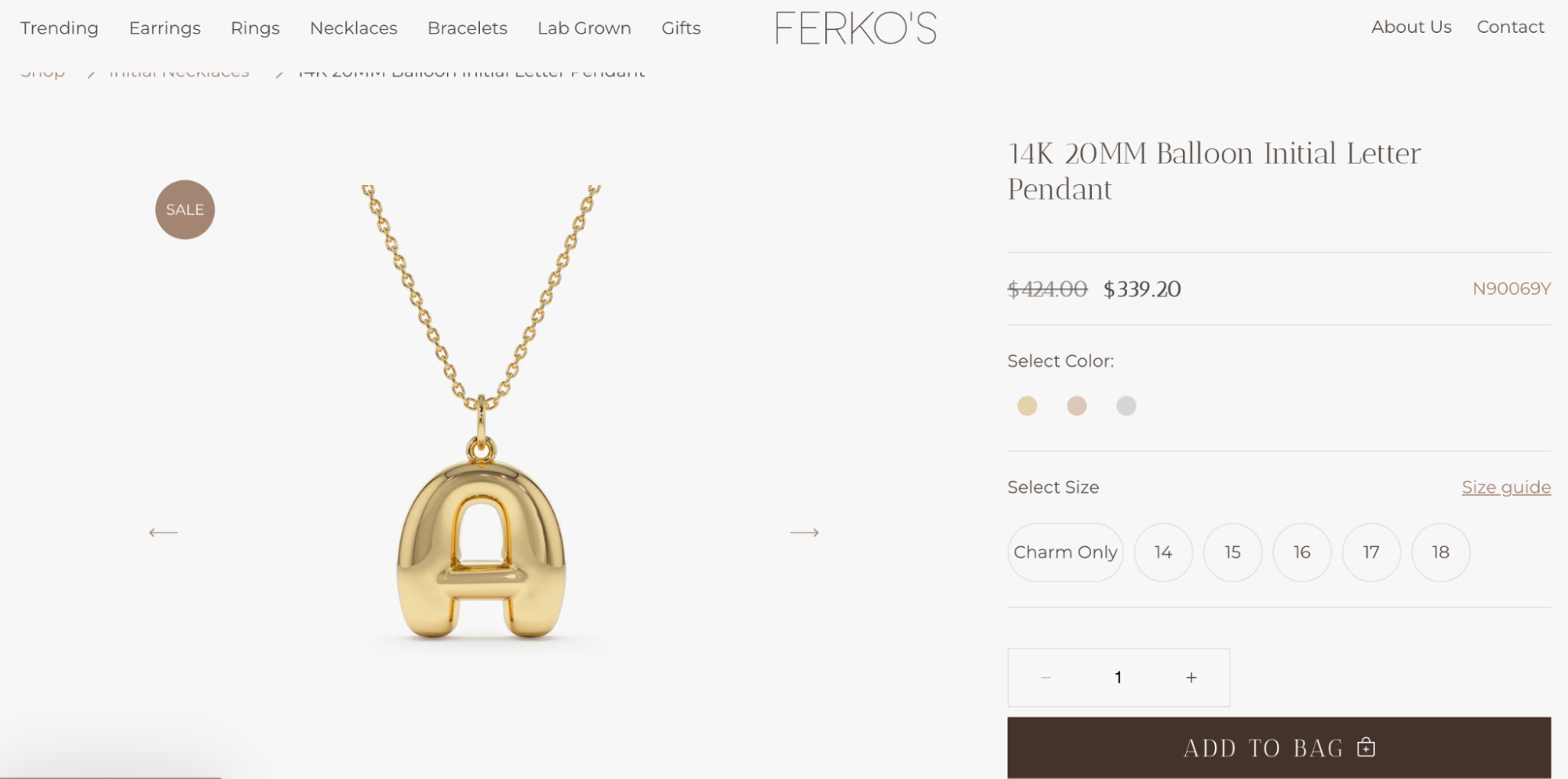 A 14K gold balloon-style initial "A" pendant necklace from Ferko’s, featuring a bold, puffy letter charm on a fine chain.