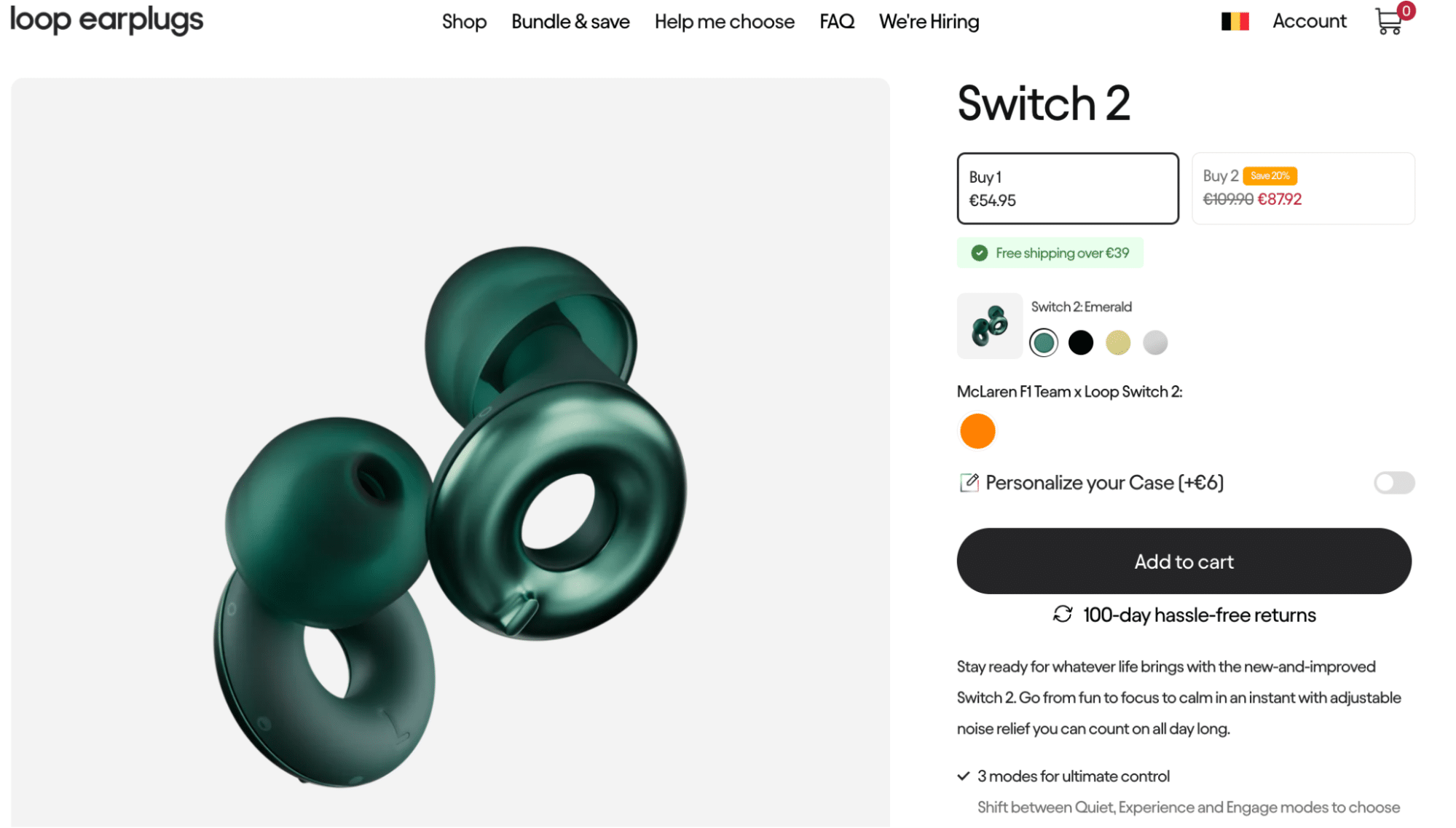 Close-up of Loop Switch 2 earplugs in emerald green, showcasing their signature circular design with adjustable noise control—offering three modes for dynamic sound management throughout the day.