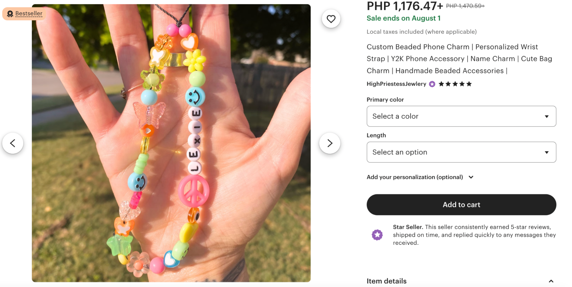 A vibrant, custom beaded phone charm featuring colorful Y2K-style beads, smiley faces, butterflies, peace signs, and the name "LEXIE" spelled out in letter beads. This handmade accessory doubles as a fun wrist strap, perfect for adding a playful, nostalgic touch to any phone or bag.